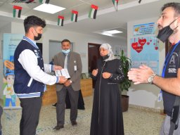 GR-12-Boys giving donation at Sharjah City for HumanitarianServices